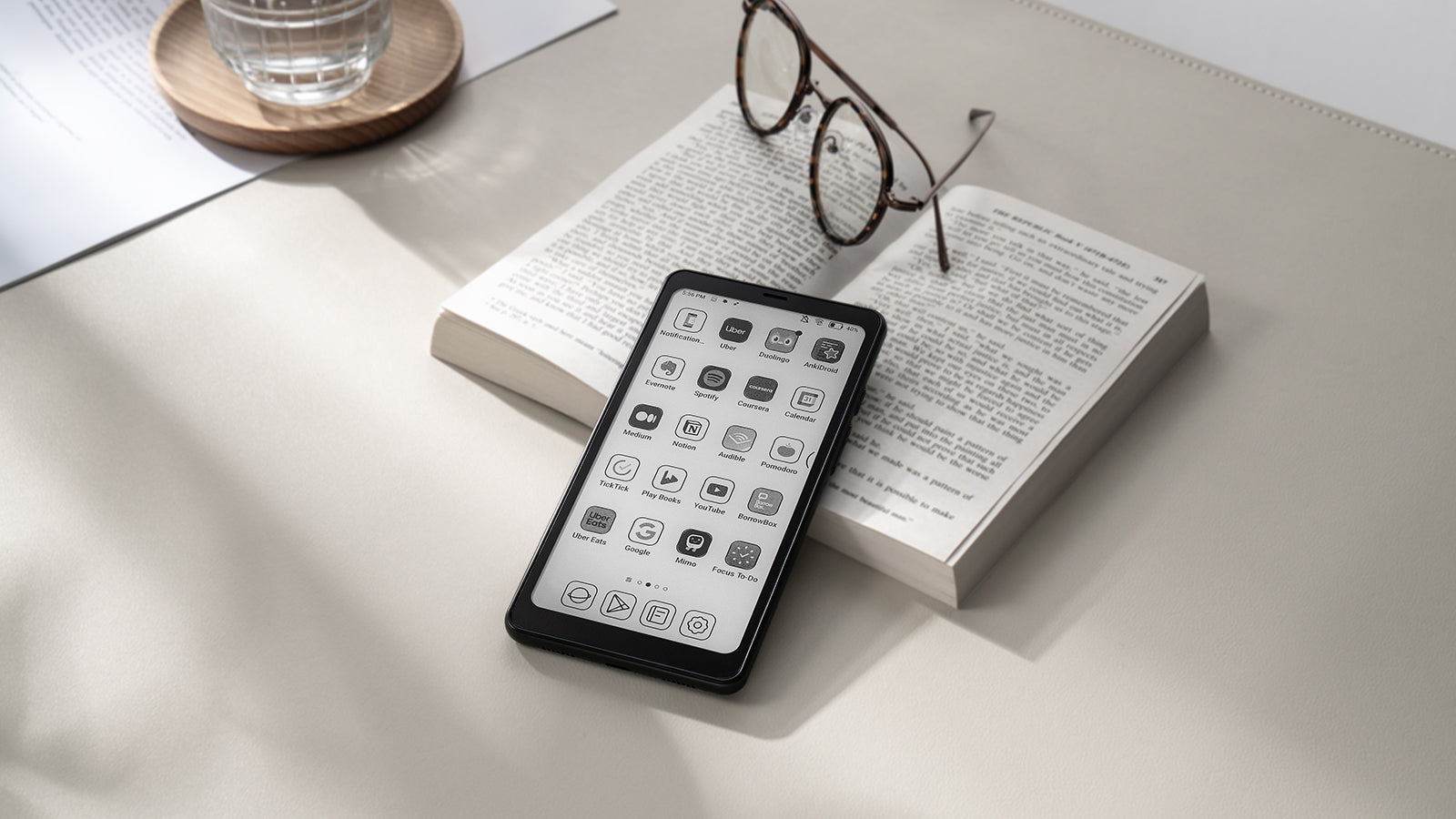 BOOX Palma e-reader placed on a desk in a minimal lifestyle setting